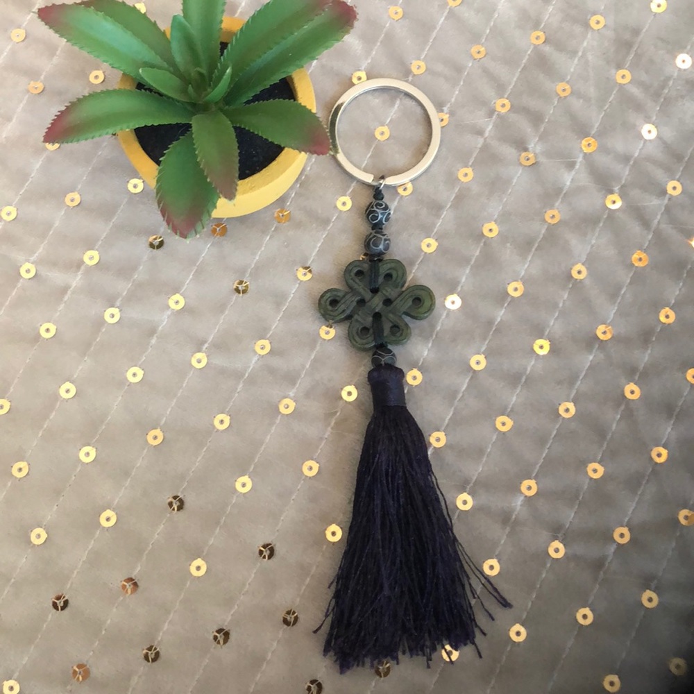Jade key ring with dark purple tassel